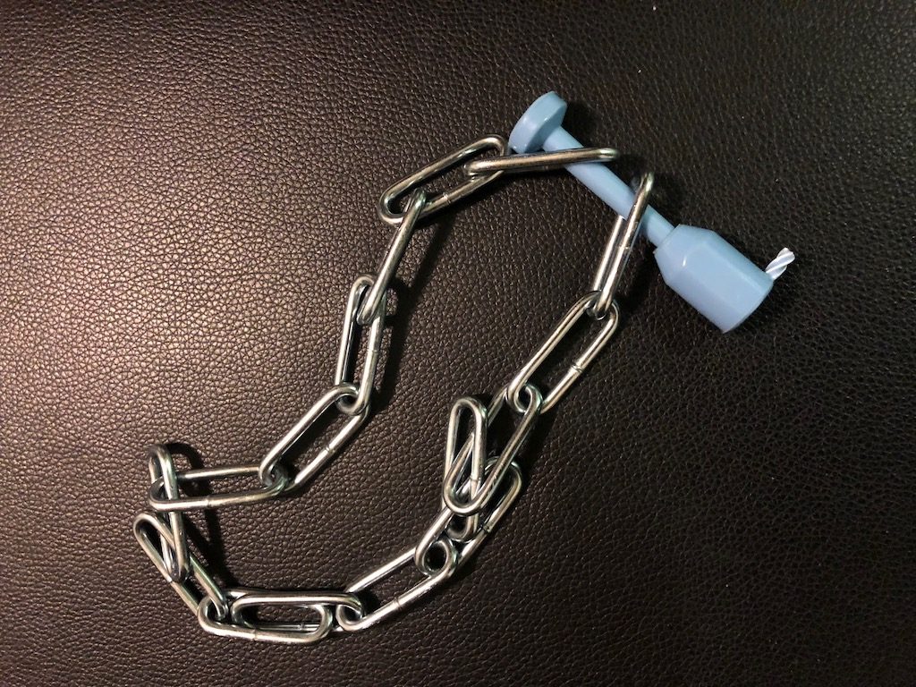 Blue B-Sealed EnaBolt 4 on a metal chain