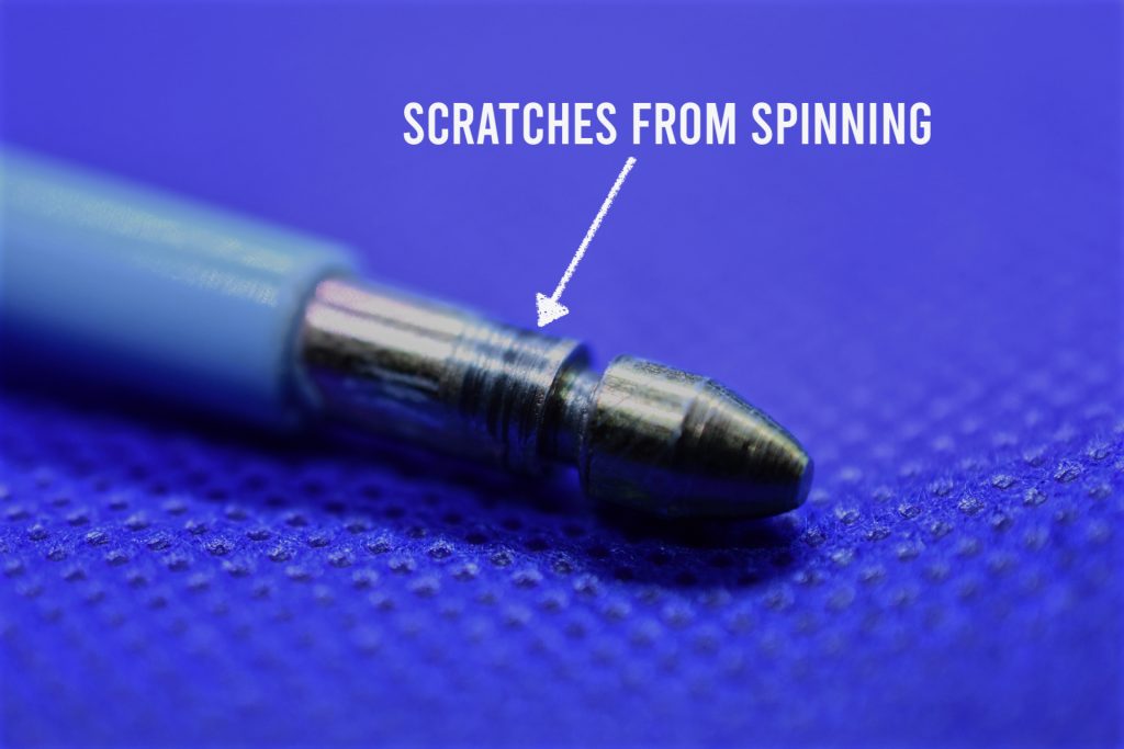 Bolt seal shaft end showing scratches from spinning attack