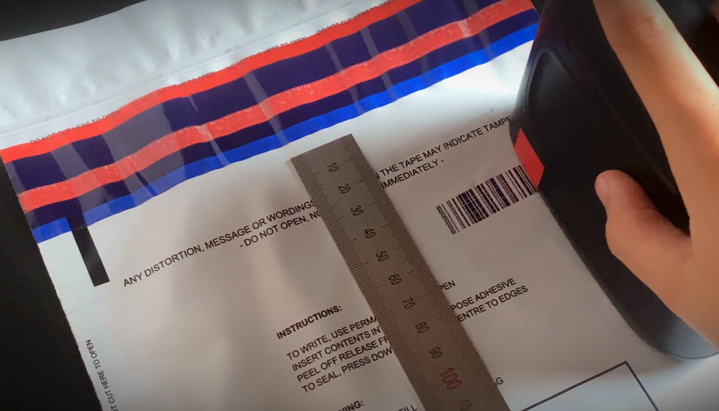 Printing a barcode onto a tamper evident satchel with an Selpic S1 printer